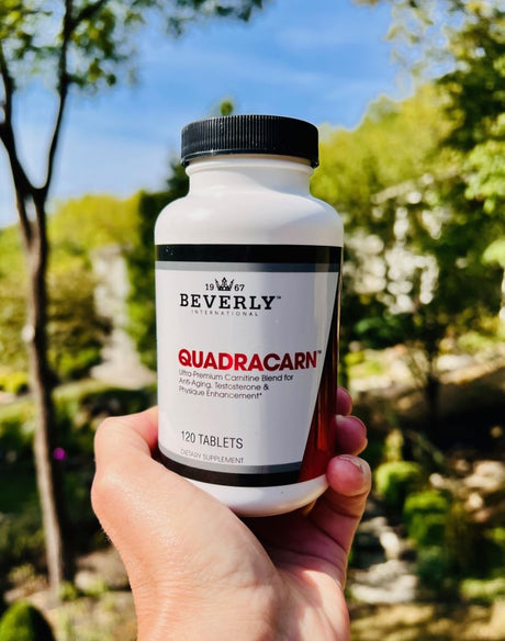 Beverly International Quadracarn liquid L-carnitine supplement bottle displayed on retail shelf at Commonwealth Nutrition in Pittsburgh, PA, premium fat loss and performance support formula