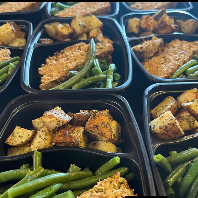 Enjoy a hearty 6oz turkey meatloaf, packed with wholesome vegetables for a nutritious and satisfying meal. Paired with savory roasted garlic potatoes and fresh green beans, this dish offers a balanced blend of flavors and textures that fuel your body and delight your taste buds.